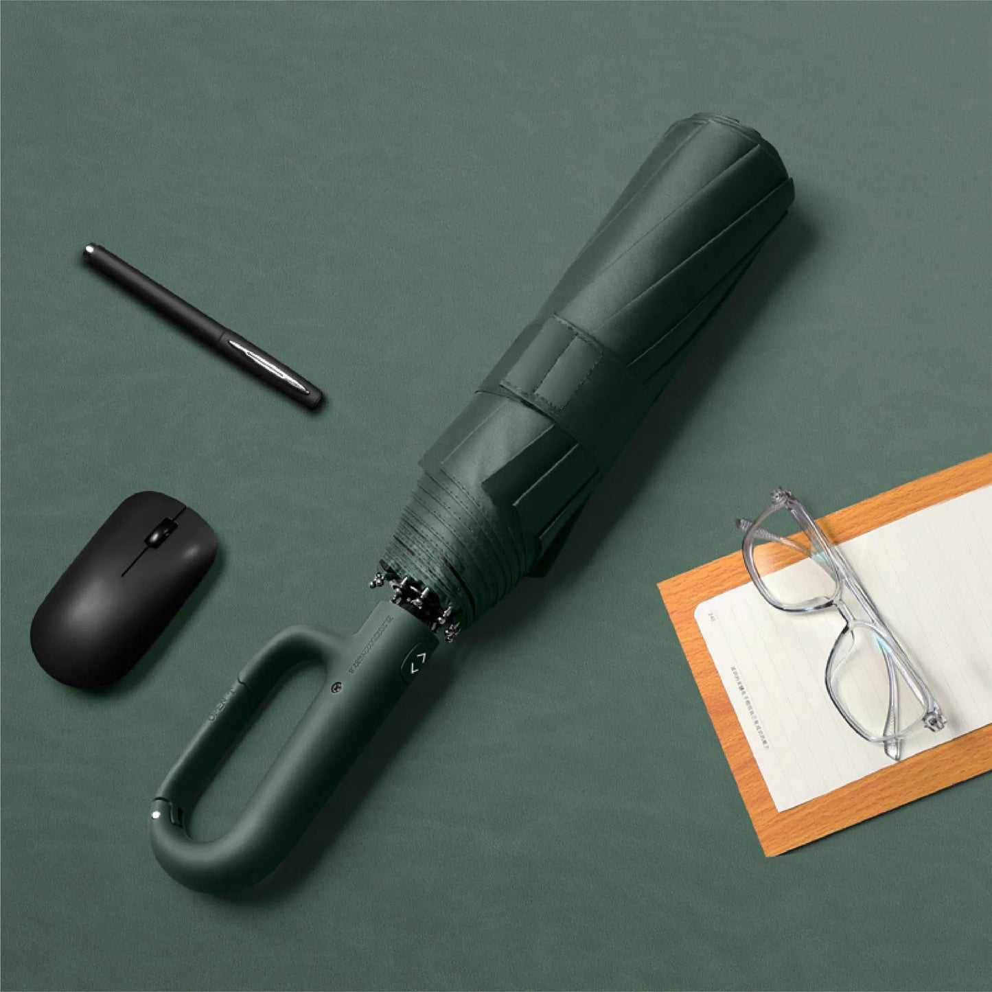 Paraply med ringspænde