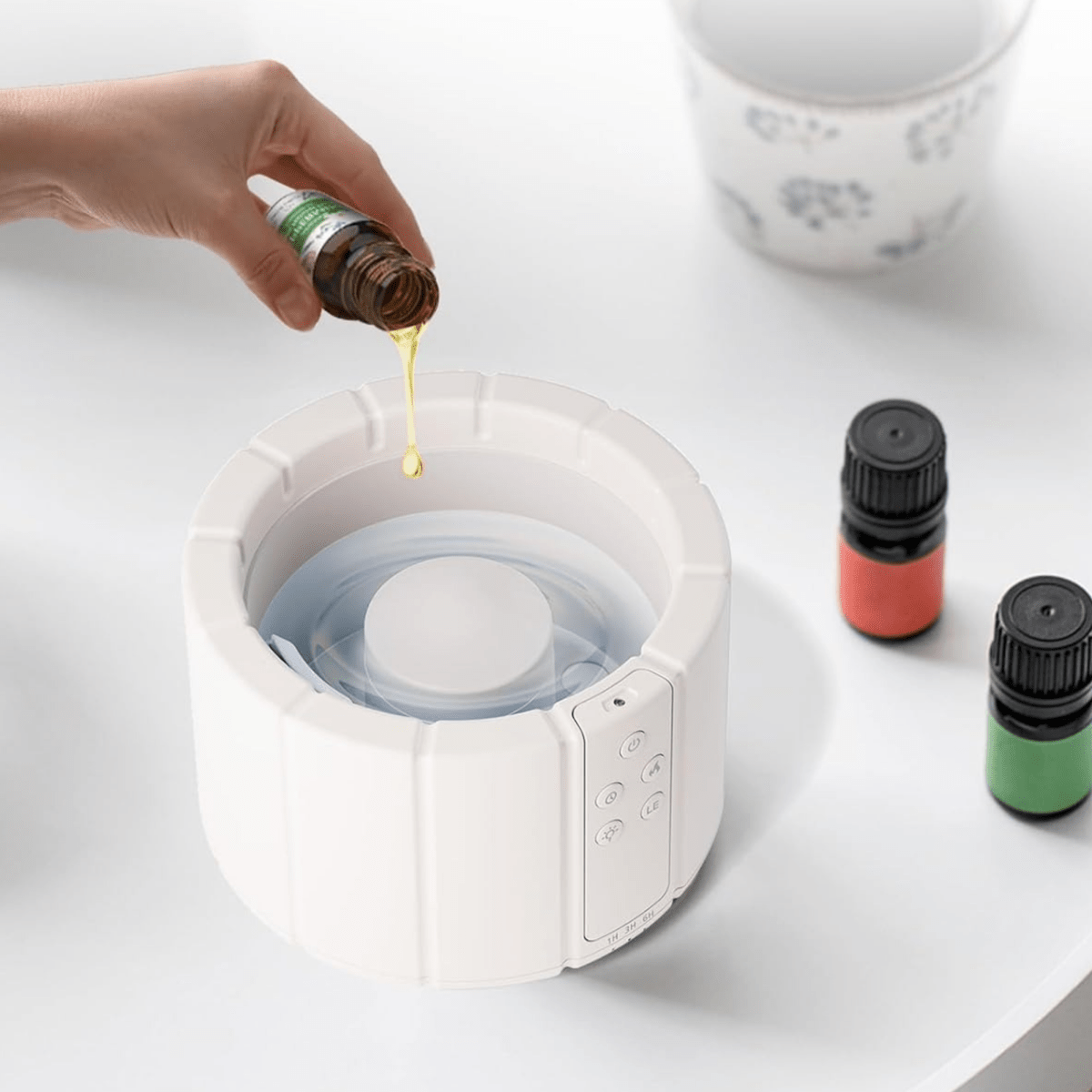 Aromadiffusor med ultralyds-luftfugter og duftolie samt afslappende belysning