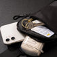 Kompakt rejsetaske med crossbody-rem