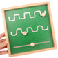 Montessori skriveforberedende træplade med sporingskugle