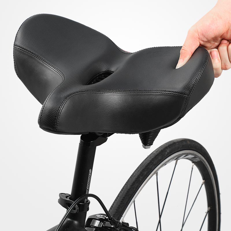 Ekstra bred ergonomisk cykelsadel med stødabsorberende polstring