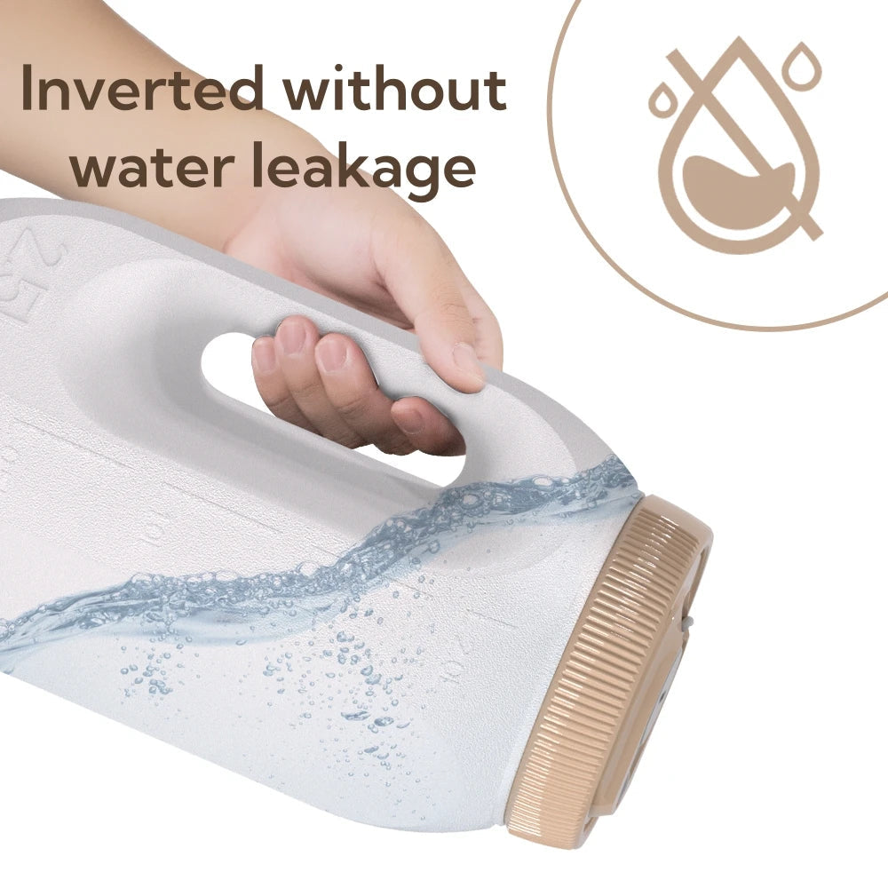 Genopladeligt rejsebidet med 2,5 liters beholder og to stråleindstillinger