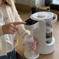 Vanddispenser til babyflasker med temperaturvalg og 2 liters beholder
