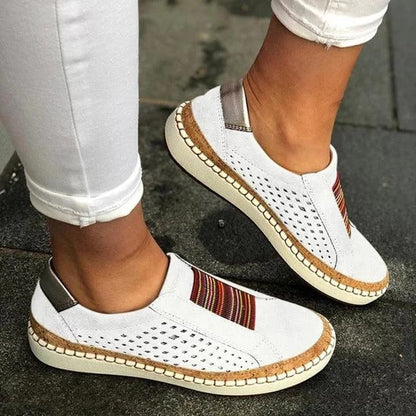 Åndbar sneaker med flad bund til kvinder til korrektion af knyster